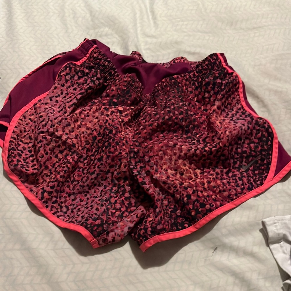 nike athletic shorts, pink and purple
